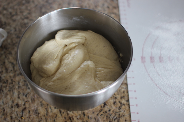 Dough placed in bowl has been doubled in size.
