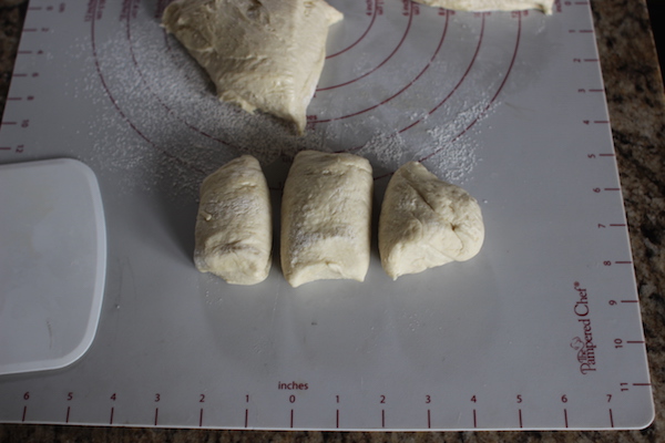 Rolling dough into balls. 