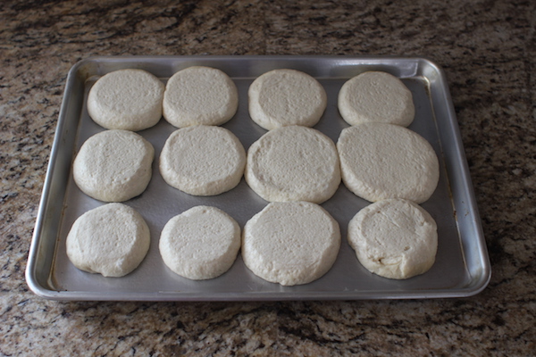 Flattened dough of english muffins. 