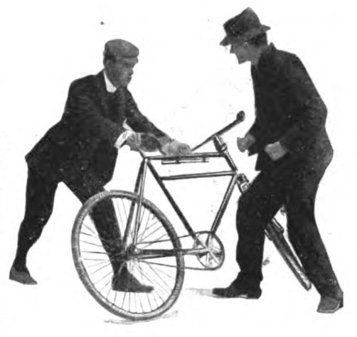 Vintage man protecting himself from another man with bicycle.