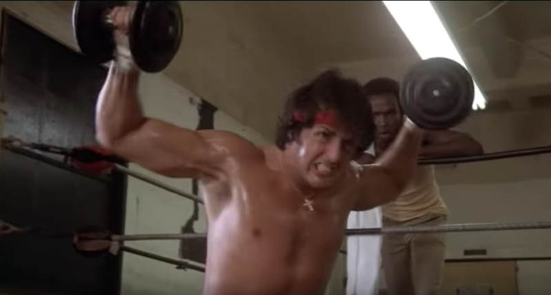 Rocky doing lateral dumbbells' raises.