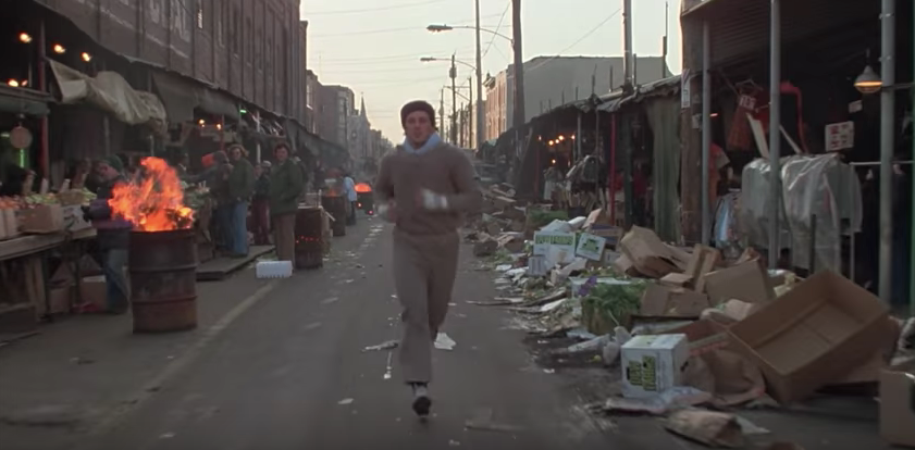 Rocky running down the street.