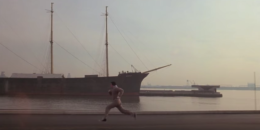 Rocky sprinting along the sea.