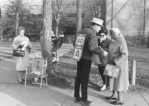 Man volunteering on political campaign.