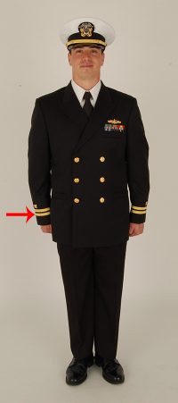 Officer have strips on the bottom of the service jacket sleeves.