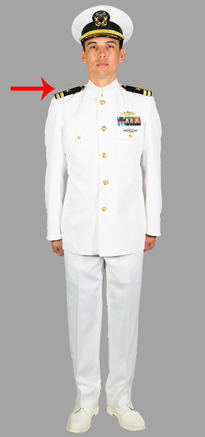 Officer wearing white uniform with boards on shoulders.