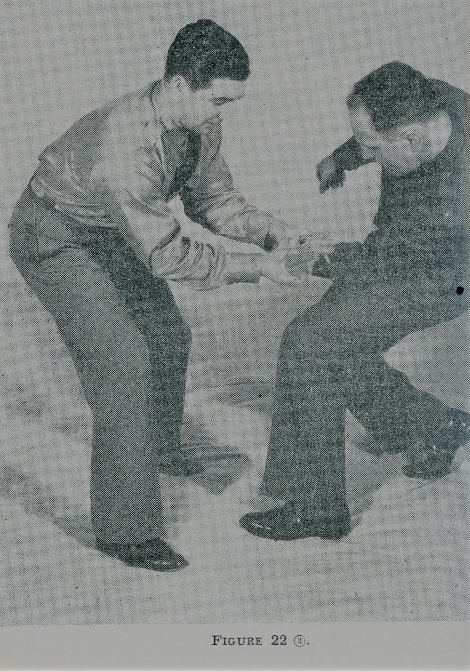 Taking opponent's hand backward during self defense.