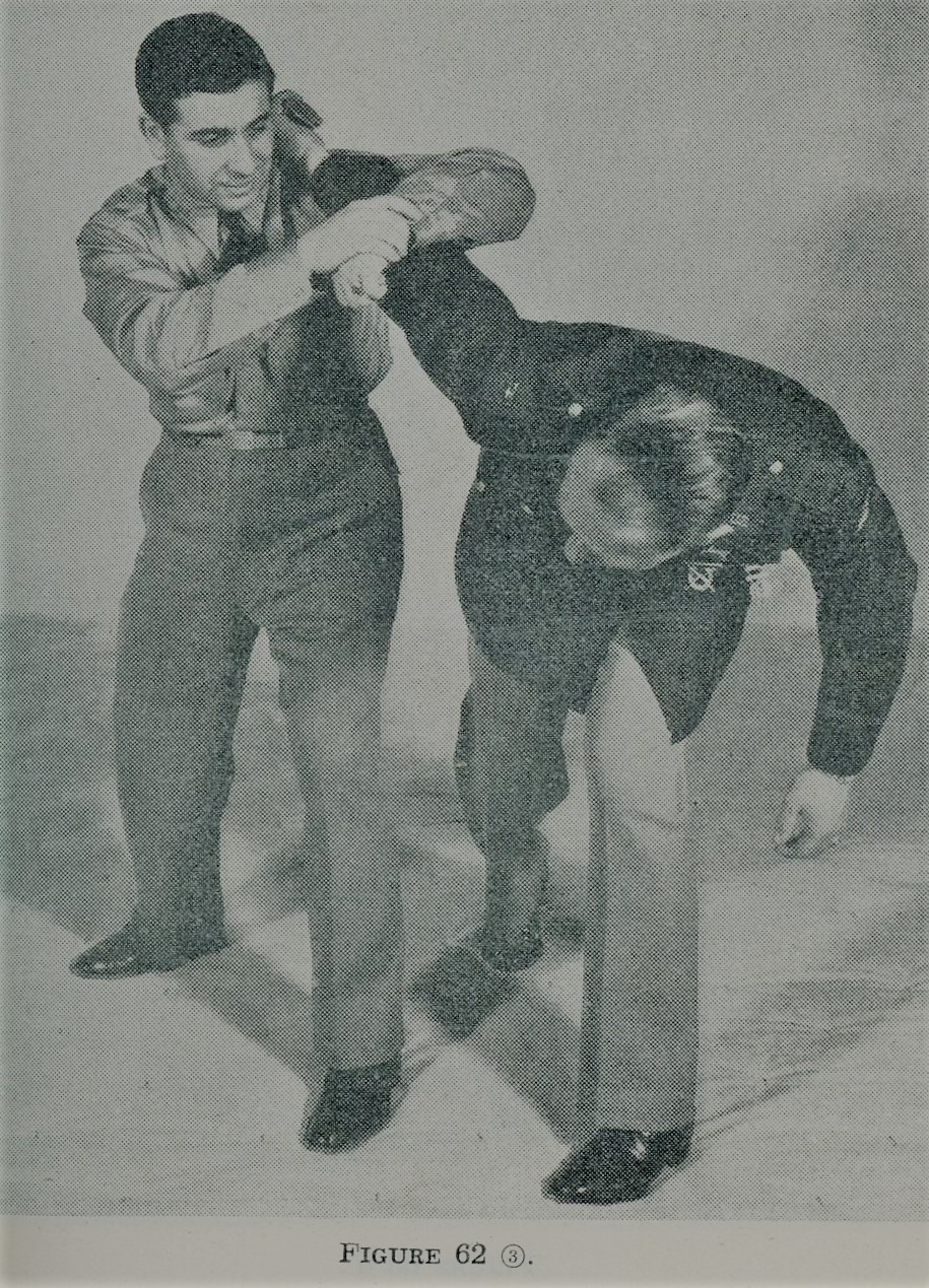 Putting pressure on opponent's right hand during self defense.