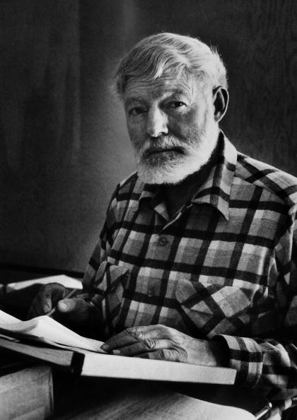 Hemingway looking at the camera.