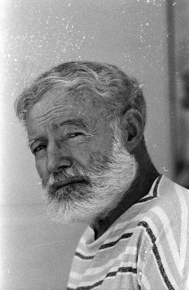 Hemingway with white beard.