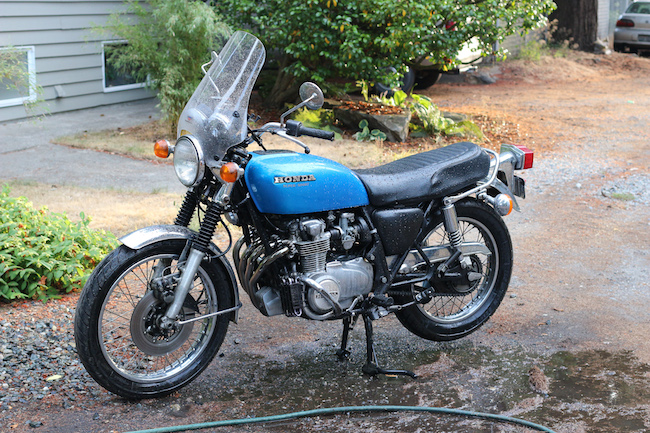 Blue Honda motorcycle displayed.