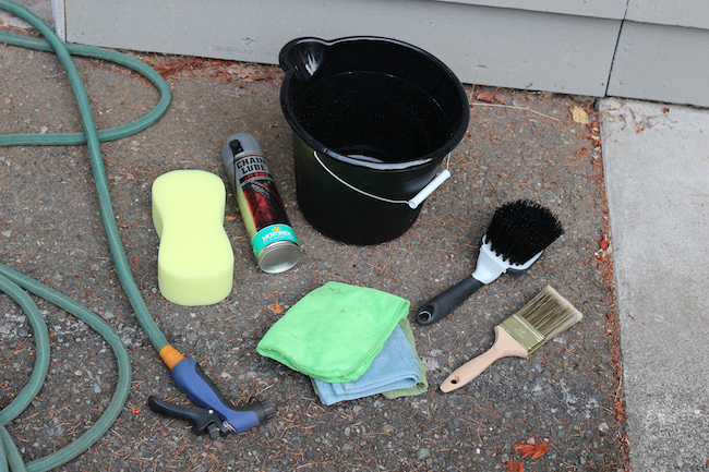 Things required for cleaning a motorbike.