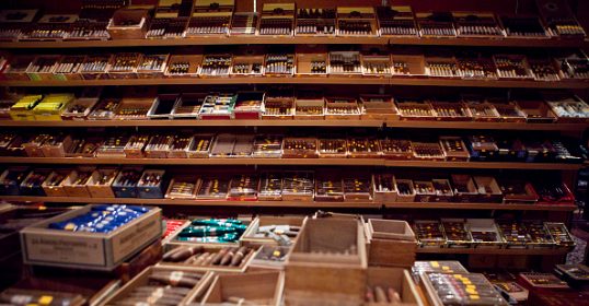 Choose from many boxes of cigars in the store.