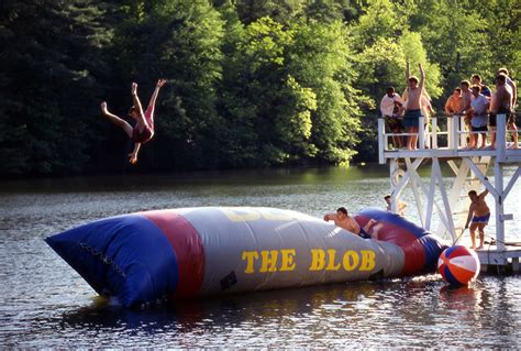 Scene from the movie "The Heavy weights" in which people are jumping on the blob.