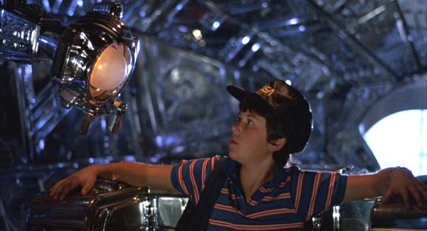 Scene from the movie " Flight of Navigator" in which boy is looking at a machine.