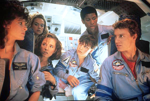 Scene from the movie "Space Camp" in which a group of astronauts are discussing in a spaceship.