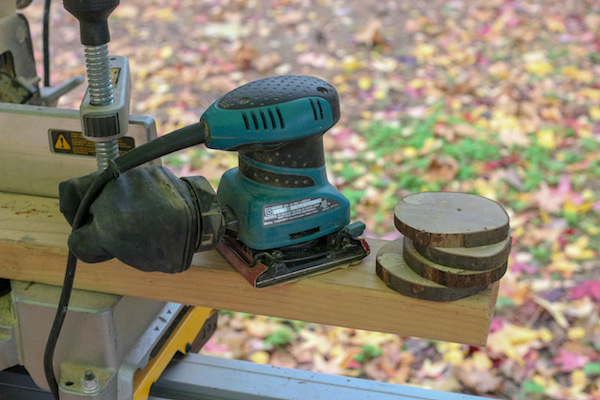 Coasters with a palm sander.