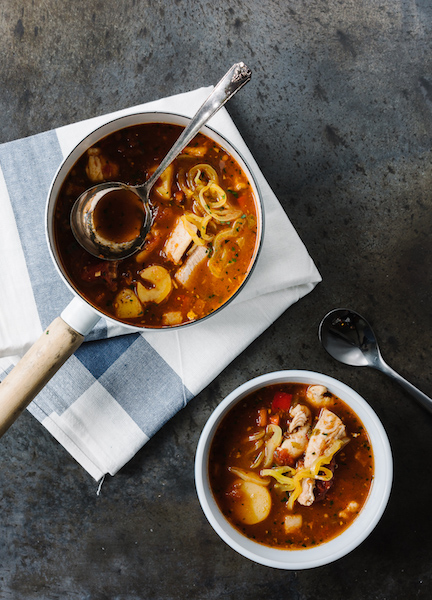 Catfish Stew in a bowl and pan with spoons.