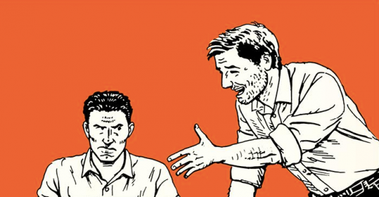 Two coworkers are discussing a deal on a laptop.