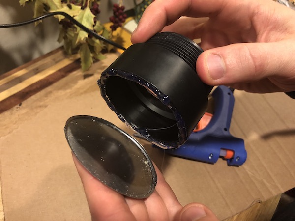 Fitting the bottom of a can with PVC.