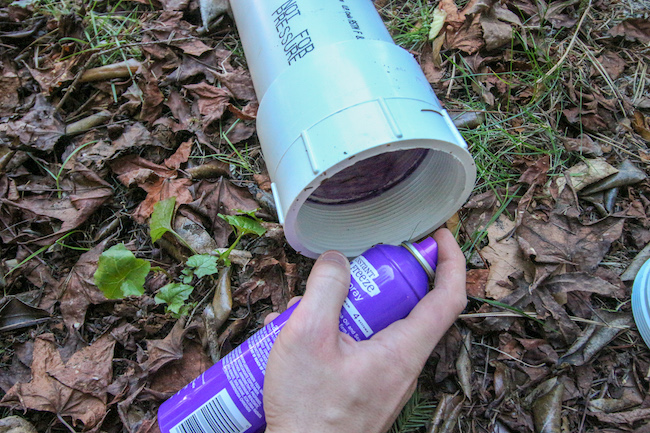 Unscrewing cap and filling combustion chamber with hairspray.