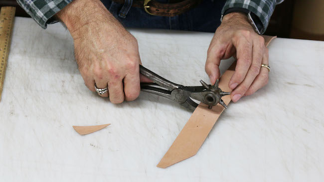 how to use a leather belt hole puncher