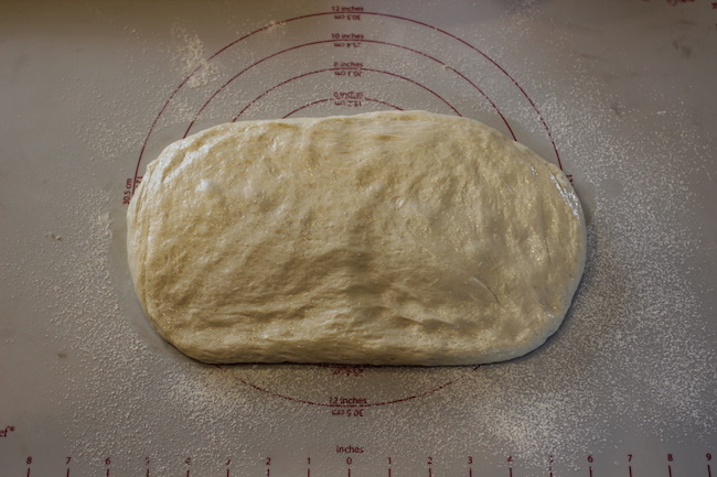 Flattened dough displayed.