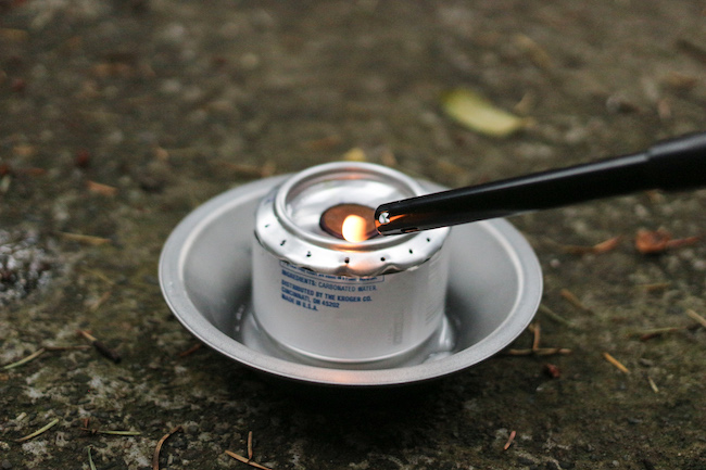 Can is lighted by using lighter stick.