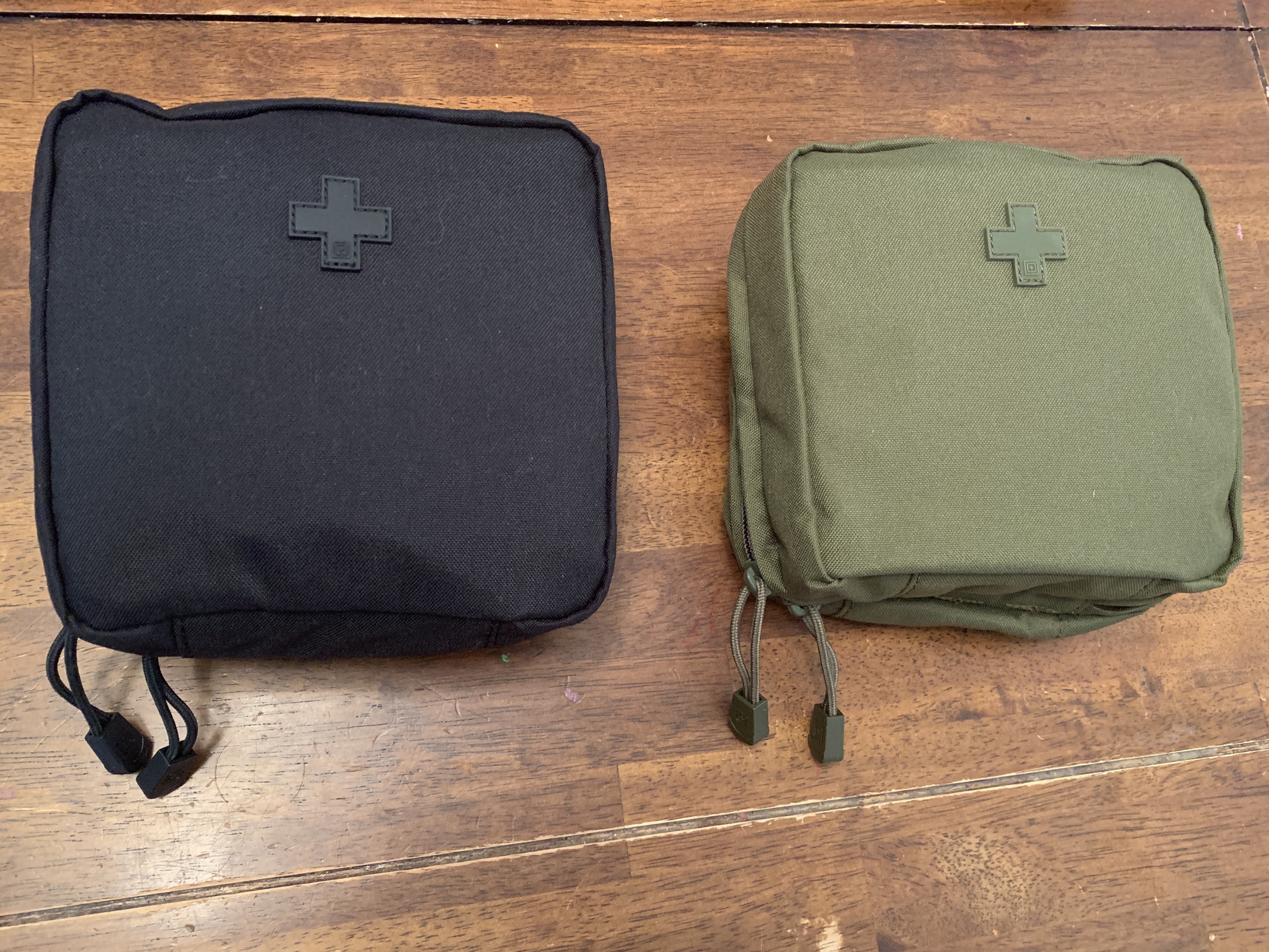 Pouches of first aid kit displayed.