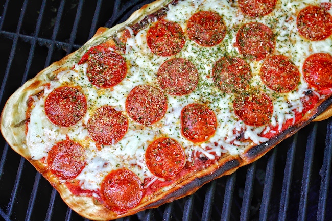 Pepperoni pizza on the grill.