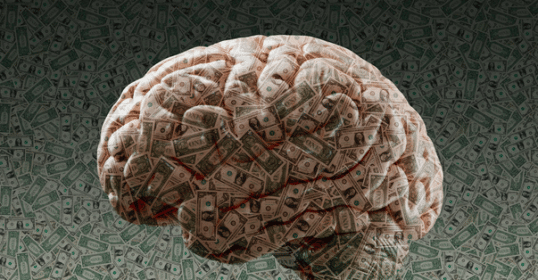An image of a brain covered in money, showcasing the psychology behind investing.