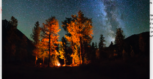 A screenshot of a Facebook page displaying a night sky and trees.