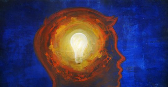 Get more Aha Insights with this unique image of a man's head with a light bulb.