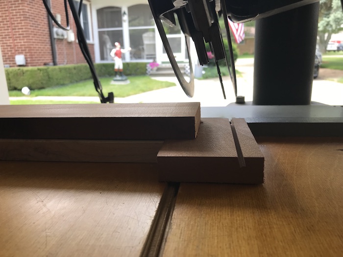 Cutting of a wood with circular saw.