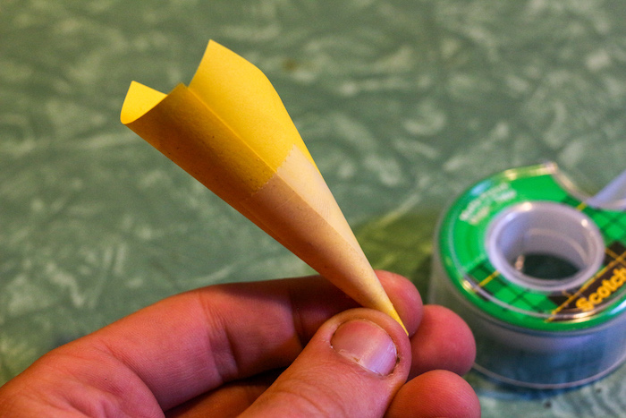 Post-It note into a cone shape and use a piece of tape to hold it in place.