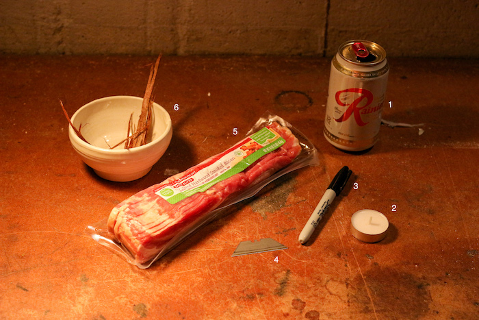 Aluminum can, Candle, Marker, Razor blade or scissors or sharp knife and Bacon, Cedar bark.