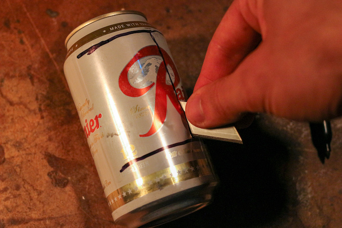 Cut the can that was marked.