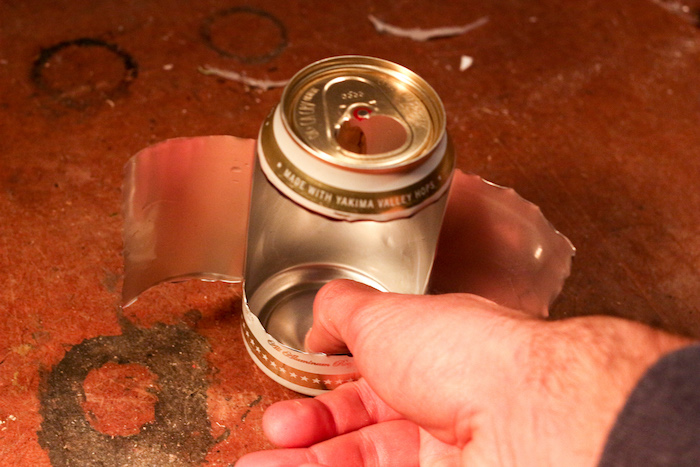 Step 3: Flatten bottom of can.