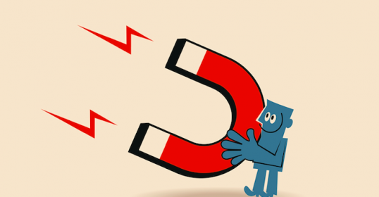 An illustration of a compelling person holding a magnet.