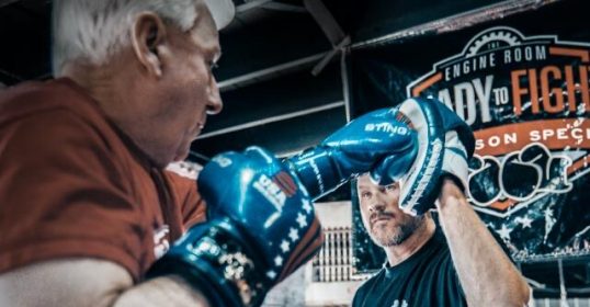 Two men in a boxing ring.