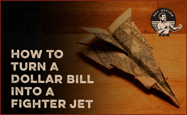Fighter jet made with dollar bill.