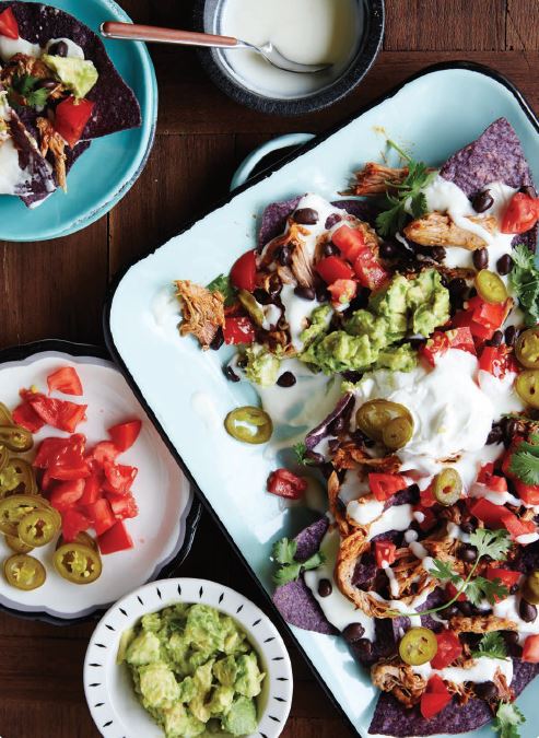 Nachos mountain in a tray.