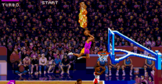A basketball game with a player jumping in the air.