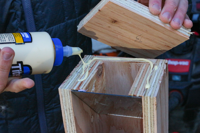 Gluing the plywood corners.