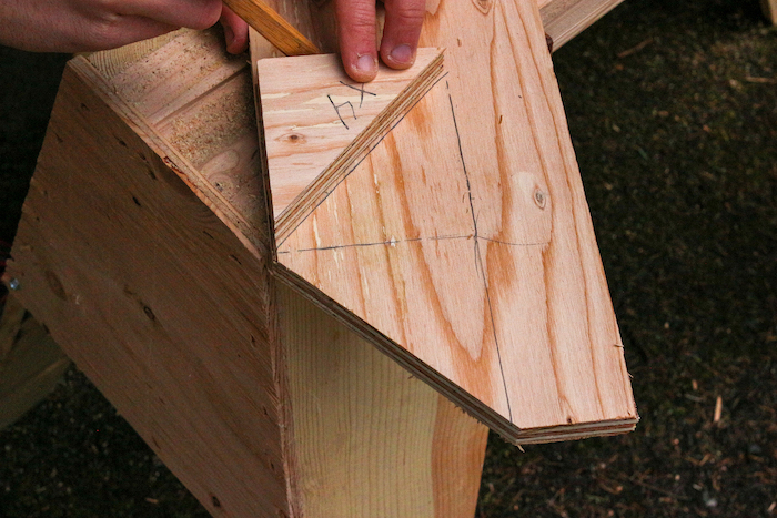 Cutting plywood in triangular shape.