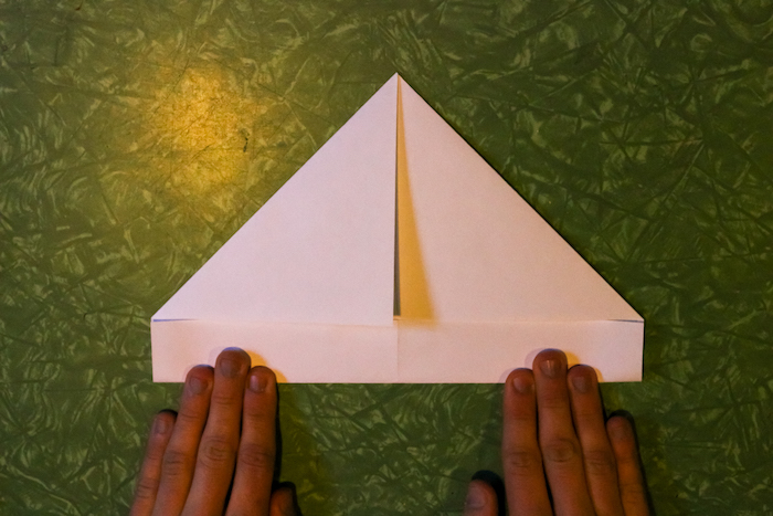 Making triangle from paper by Folding.