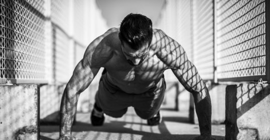 Black and white image of a man doing push ups, Get, Podcast