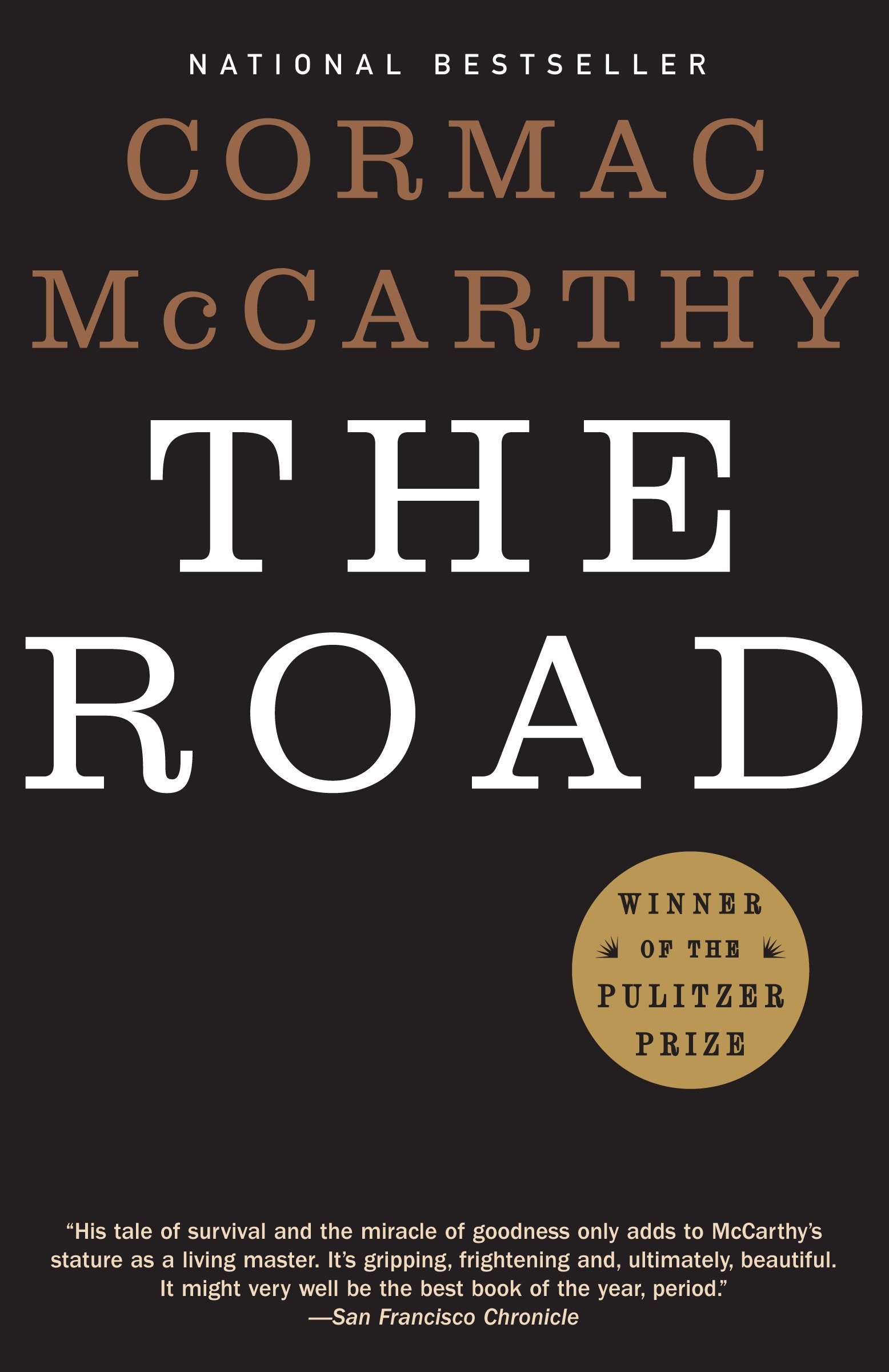 A book cover of "The Road" by Cormac McCarthy. 