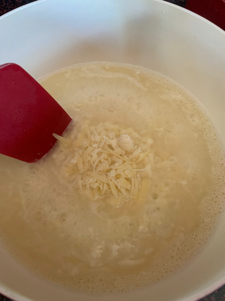 Cheese with the cornstarch in bowl.