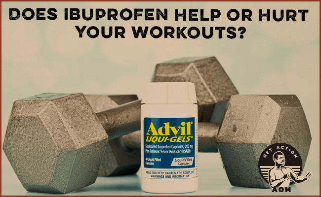 advil container in front of dumbbells.